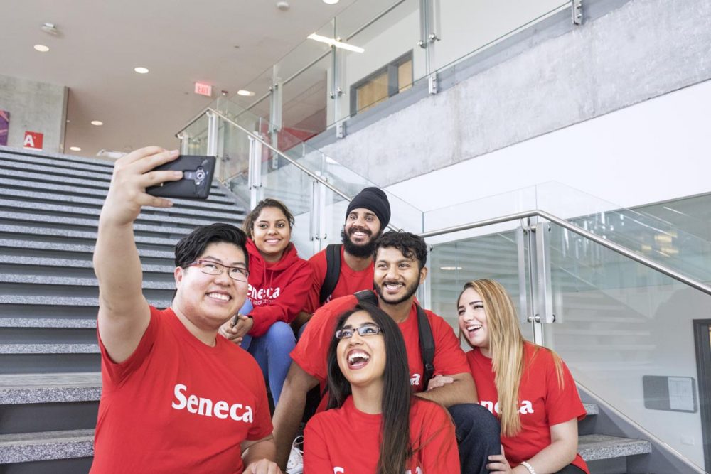 A group of happy Seneca students.
