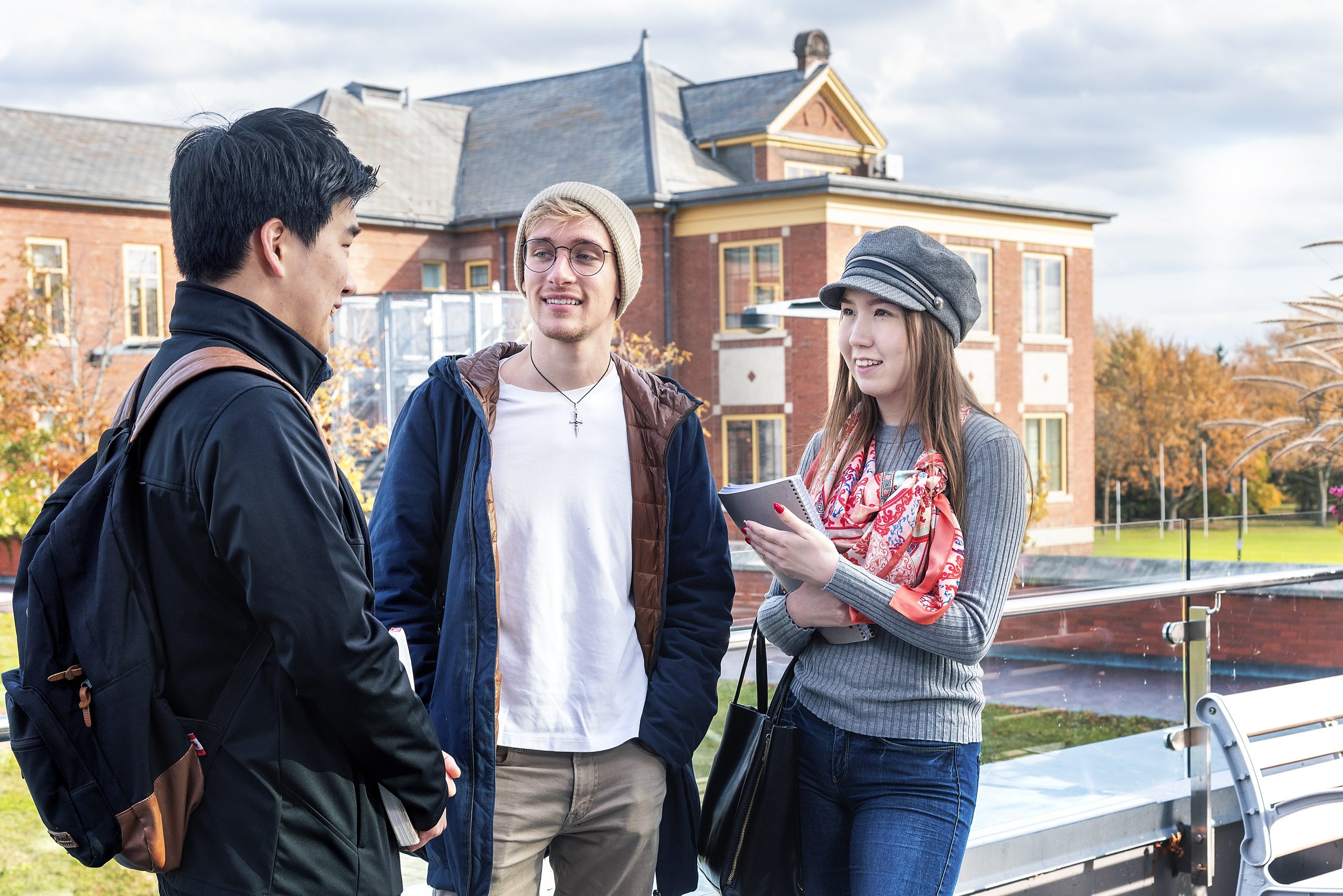 Three students chatting at Humber College's Lakeshore Campus