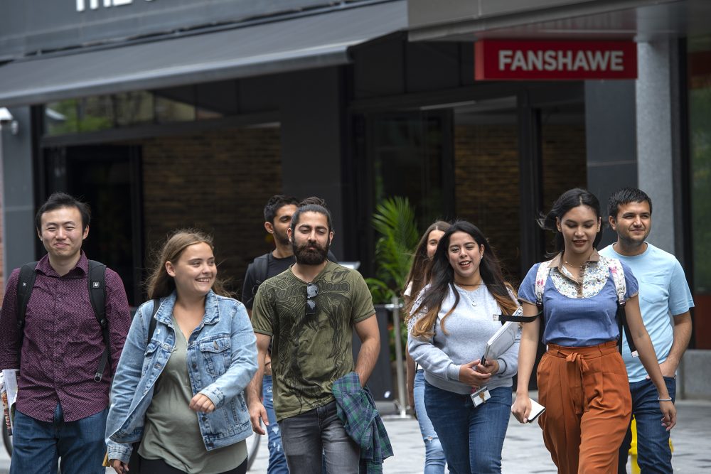 Students walking through London Downtown Campus