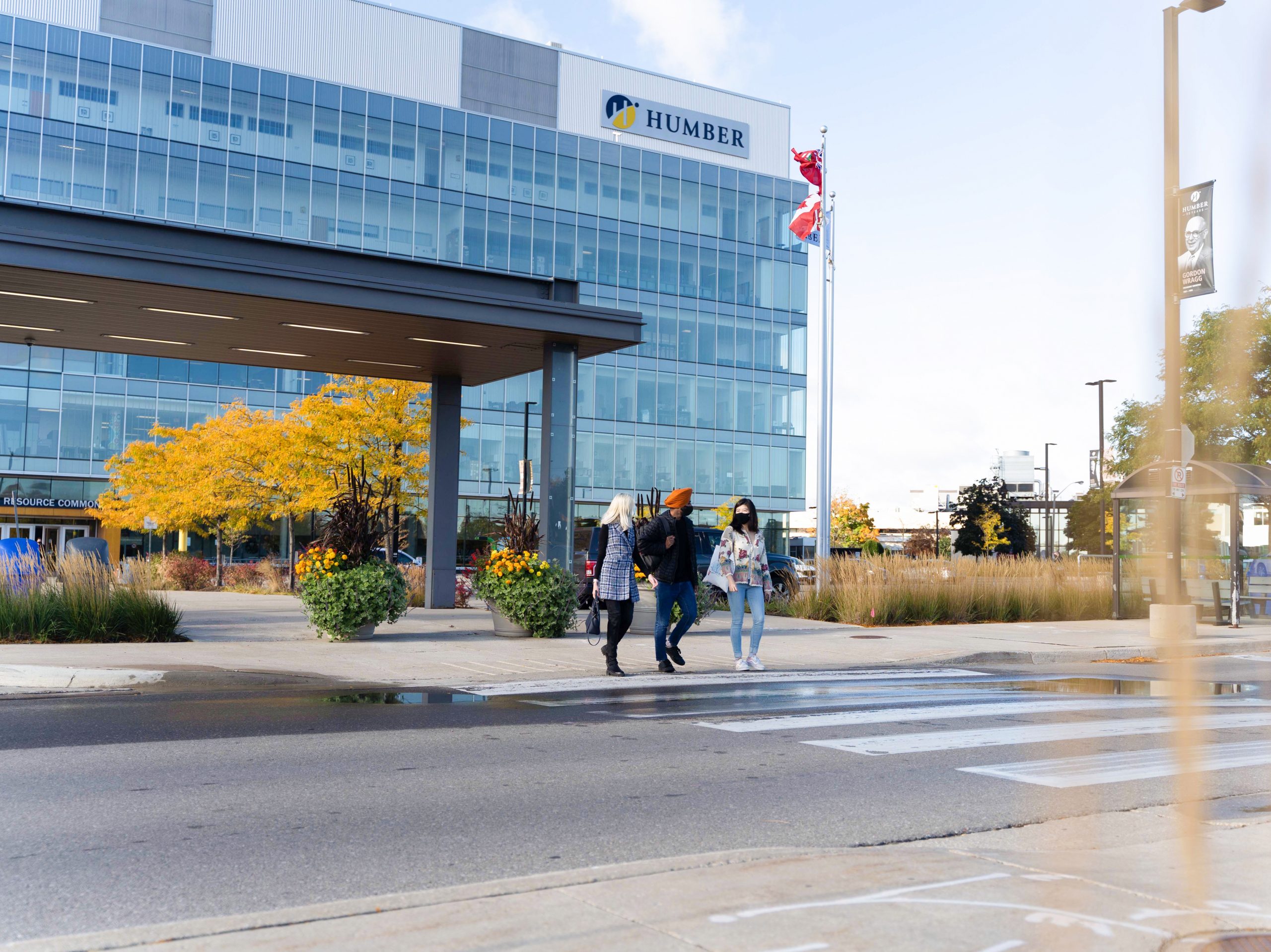 A group of students walking together at Humber College's North Campus.
